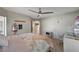Bright bedroom with a queen bed and plenty of natural light at 8870 S Tenaya Way, Las Vegas, NV 89113