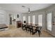Breakfast nook with rustic wooden table and built-in seating at 8870 S Tenaya Way, Las Vegas, NV 89113