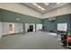 Spacious game room with basketball hoop and exercise equipment at 8870 S Tenaya Way, Las Vegas, NV 89113
