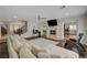 Spacious living area with hardwood floors and fireplace at 8870 S Tenaya Way, Las Vegas, NV 89113