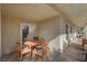 Covered patio with table and chairs, ideal for outdoor dining at 8870 S Tenaya Way, Las Vegas, NV 89113