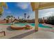 Inviting pool and spa with flagstone coping at 8870 S Tenaya Way, Las Vegas, NV 89113