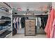 Large walk-in closet with shelving and drawers at 8870 S Tenaya Way, Las Vegas, NV 89113