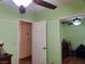Bright bedroom showcasing green walls and closet with mirrored sliding door at 9022 Sosa Creek Ave, Las Vegas, NV 89149