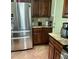 Kitchen features stainless steel appliances and granite countertops at 9022 Sosa Creek Ave, Las Vegas, NV 89149