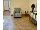 Comfortable living room chair with tile floors at 9022 Sosa Creek Ave, Las Vegas, NV 89149