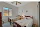 Bright bedroom with two twin beds, natural light and closet for storage at 9843 Wonderful Day Dr, Las Vegas, NV 89148