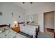 Charming bedroom with two twin beds, mirrored closet doors, and carpeted floor at 9843 Wonderful Day Dr, Las Vegas, NV 89148