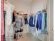 Spacious walk-in closet provides ample space for organization and storage of clothing and accessories at 9843 Wonderful Day Dr, Las Vegas, NV 89148