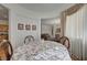 Elegant dining area boasts an decorative window, hardwood flooring, and stylish furnishings at 9843 Wonderful Day Dr, Las Vegas, NV 89148