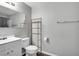 Clean and bright bathroom with chrome fixtures and a decorative shelf at 2152 Quarry Ridge St # 106, Las Vegas, NV 89117