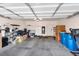 A spacious two car garage area with lighting and ample room for storage at 2152 Quarry Ridge St # 106, Las Vegas, NV 89117