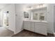 Bright bathroom with double vanity and modern fixtures at 10328 Apefly St, Las Vegas, NV 89141