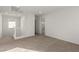 Spacious loft area with carpeted flooring and white walls at 10328 Apefly St, Las Vegas, NV 89141