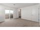 Spacious main bedroom with private balcony access at 10328 Apefly St, Las Vegas, NV 89141