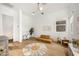 Bright living room with hardwood floors, a modern sofa, and a round rug at 10420 Luella Ct, Las Vegas, NV 89143