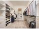 Organized walk-in closet with built-in shelves and drawers, offering ample storage for shoes, clothes and accessories at 10420 Luella Ct, Las Vegas, NV 89143