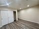 Bedroom featuring wood floors and a double door closet at 10618 Timber Stand St, Las Vegas, NV 89183
