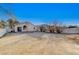 Large backyard showcasing the home's exterior, providing a sense of space and potential for landscaping at 1106 Emerald Stone Ave, North Las Vegas, NV 89081