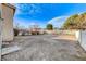 Expansive backyard with block and vinyl fencing, offering privacy and space for outdoor activities at 1106 Emerald Stone Ave, North Las Vegas, NV 89081