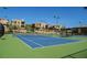 Well-maintained tennis courts with surrounding landscaping at 11262 Corsica Mist Ave, Las Vegas, NV 89135