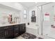 Bright bathroom with double vanity, soaking tub, tiled shower, and modern fixtures at 1209 Crystal Grotto Ave, North Las Vegas, NV 89081