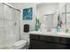 Modern bathroom featuring a glass-enclosed shower, sleek vanity, and contemporary decor at 1209 Crystal Grotto Ave, North Las Vegas, NV 89081