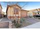 Attractive single story house featuring a brick driveway and desert landscaping at 1209 Crystal Grotto Ave, North Las Vegas, NV 89081