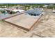 Aerial view of a new home in a residential area with a fenced yard at 1691 Blackhorn St, Pahrump, NV 89048