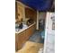 Kitchen featuring a refrigerator, sink, and countertops covered by an untidy tarp at 1836 Mcdaniel St, North Las Vegas, NV 89030