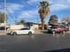 Modest single-story home on a city street, cars parked out front and a palm tree in the yard at 1836 Mcdaniel St, North Las Vegas, NV 89030