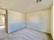 Neutral bedroom featuring carpet flooring and blank walls at 1838 Fighting Falcon Ln, North Las Vegas, NV 89031