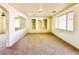 Bright living room featuring built-in shelves and natural light at 1838 Fighting Falcon Ln, North Las Vegas, NV 89031