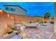 Relaxing backyard with hammock and patio furniture at 200 Denette Ln, North Las Vegas, NV 89031