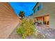 Landscaped backyard with a lemon tree and patio furniture at 200 Denette Ln, North Las Vegas, NV 89031