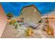 Landscaped backyard with hammock, patio furniture and string lights at 200 Denette Ln, North Las Vegas, NV 89031