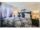 Comfortable bedroom with king-size bed and stylish decor at 200 Denette Ln, North Las Vegas, NV 89031