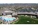 Aerial view of community amenities including pool, clubhouse, and expansive green areas at 2127 Sawtooth Mountain Dr, Henderson, NV 89044