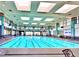 Resort-style indoor swimming pool with skylights at 2127 Sawtooth Mountain Dr, Henderson, NV 89044