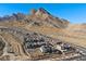 Aerial shot of the community showing the homes surrounded by beautiful mountain views at 2384 Ridgeline Wash St, Las Vegas, NV 89138