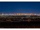 Expansive night view of the Las Vegas cityscape, showcasing vibrant lights and the iconic skyline at 2384 Ridgeline Wash St, Las Vegas, NV 89138