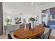 Dining area featuring an oval wood table and views of the living room at 2384 Ridgeline Wash St, Las Vegas, NV 89138