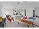 Bright and airy living room, with a view of kitchen and stairs at 2384 Ridgeline Wash St, Las Vegas, NV 89138