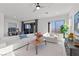 Modern living room featuring stylish furniture, large windows with scenic views at 2384 Ridgeline Wash St, Las Vegas, NV 89138