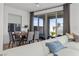 Living room featuring large sliding glass doors to the outside seating area at 2384 Ridgeline Wash St, Las Vegas, NV 89138