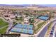 An aerial view of community featuring tennis courts, pools, and golf course highlighting the neighborhood's lifestyle amenities at 24 Cerchio Alto, Henderson, NV 89011