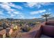 Scenic aerial view of the neighborhood showcasing mountains, houses, and lush greenery at 24 Cerchio Alto, Henderson, NV 89011