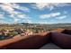 Enjoy panoramic city and mountain views from the cozy balcony of this beautiful luxury home at 24 Cerchio Alto, Henderson, NV 89011