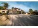 A gated entrance with ornate design and a view of the mountain at 24 Cerchio Alto, Henderson, NV 89011