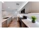 Modern kitchen with gray cabinets, quartz countertops, and stainless steel appliances at 247 Dougram Ave, Las Vegas, NV 89101